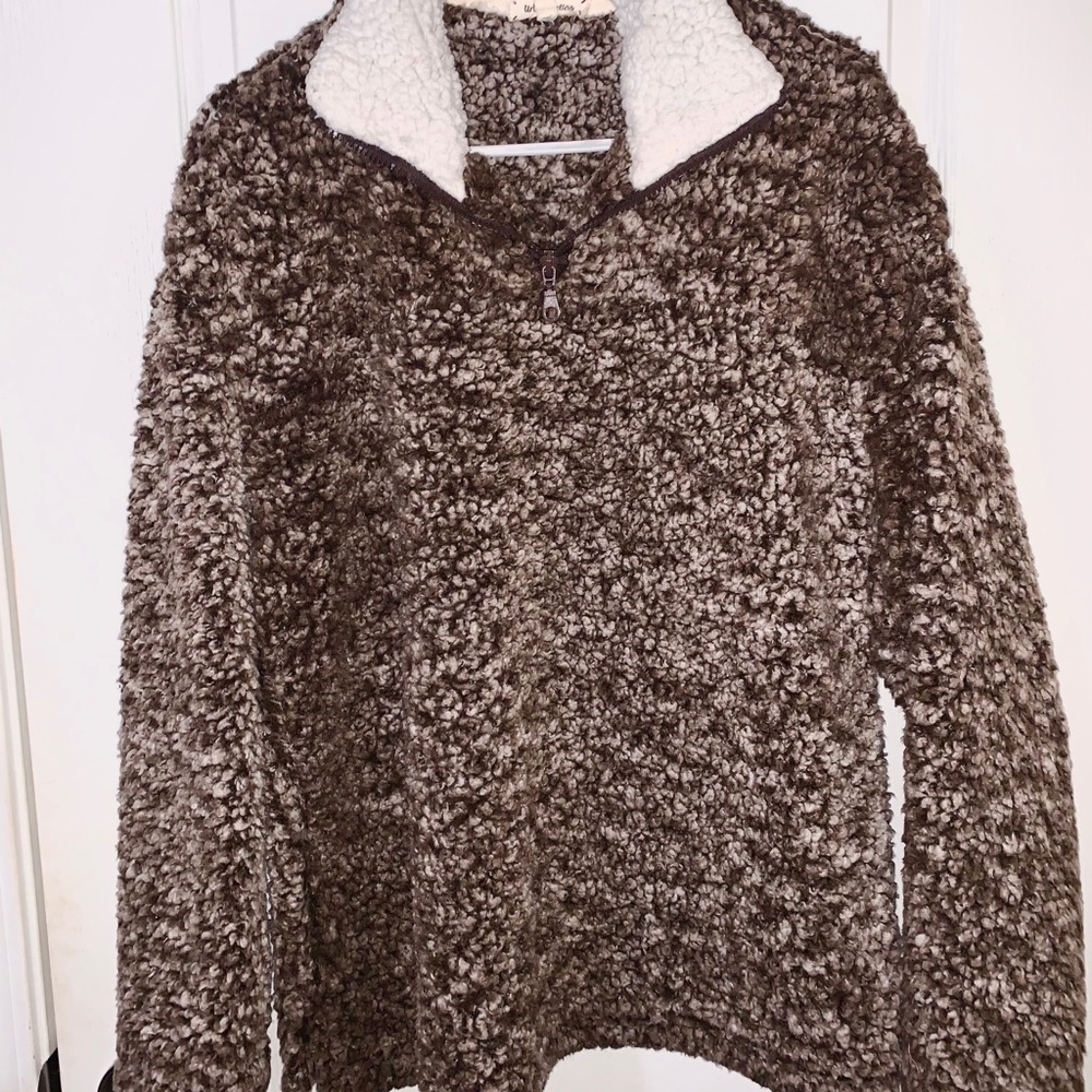 Brown and white fluffy pull over